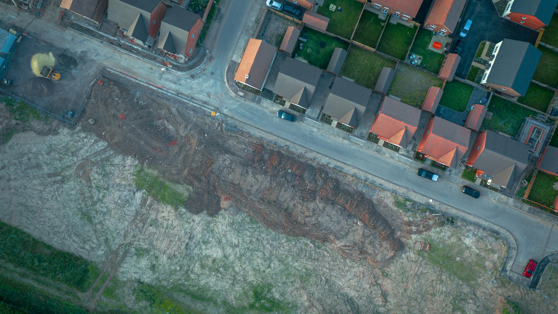 Aerial Image of Houses next to a development site