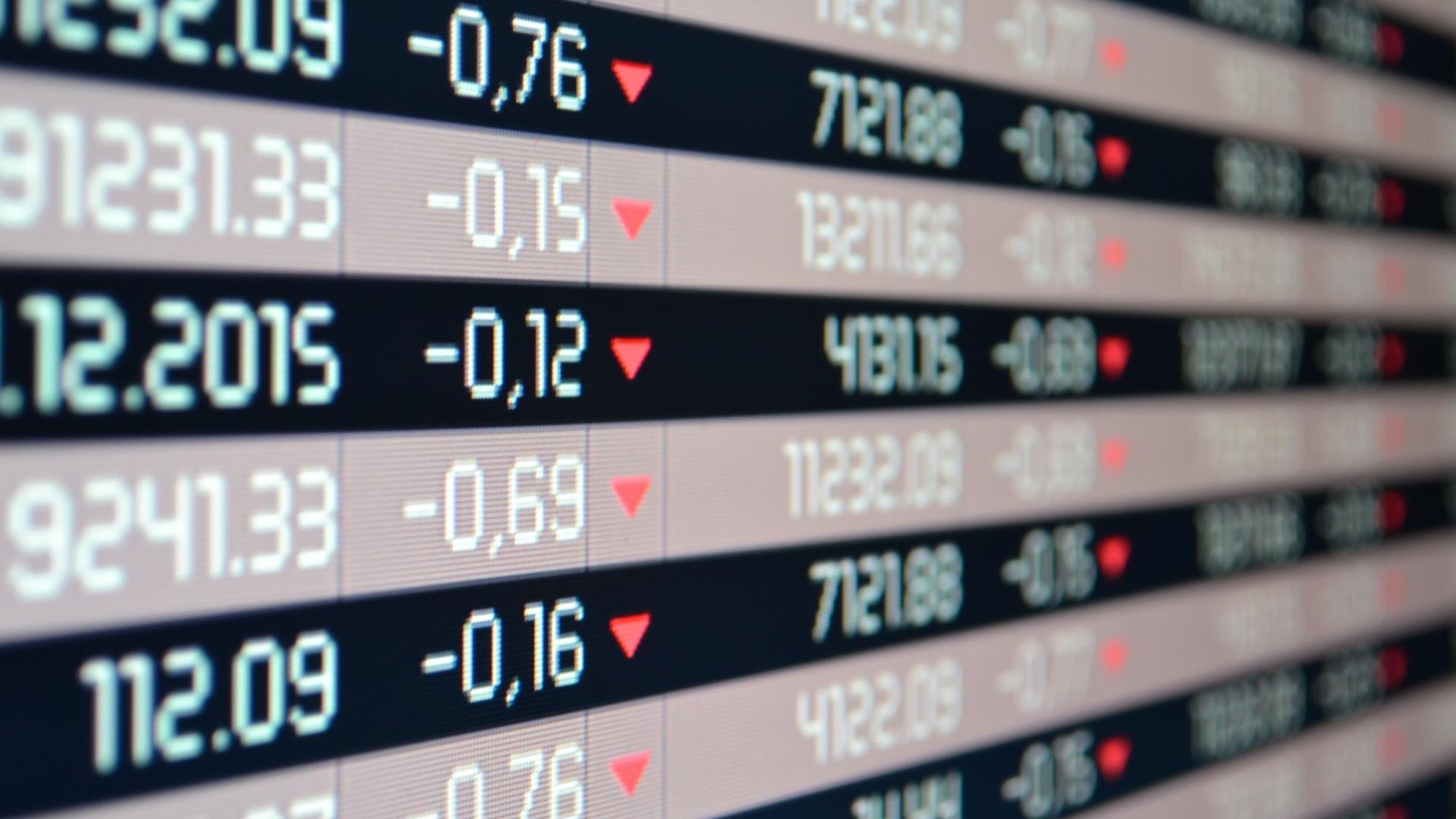 Image of an electronic display of the stock market